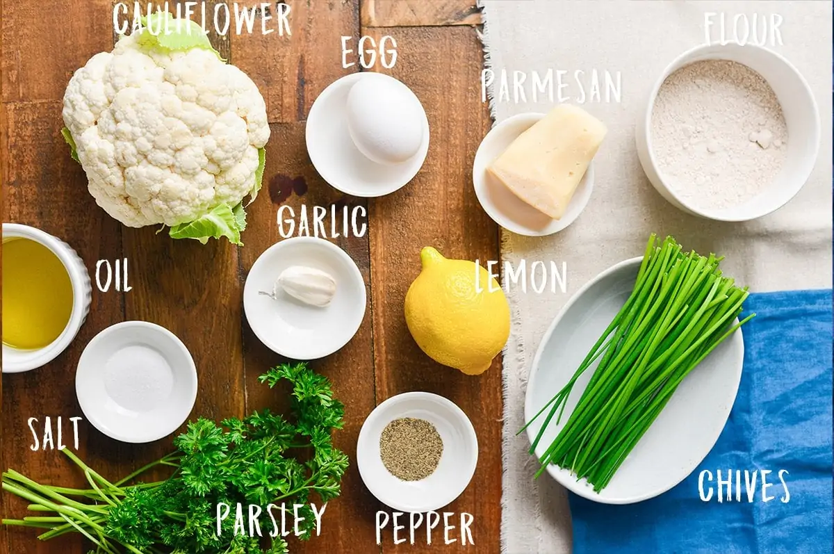 Ingredients for cauliflower fritters on a table.