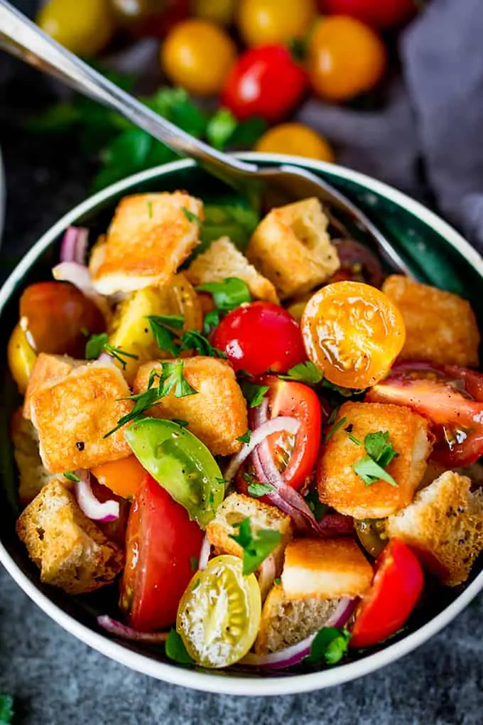 Panzanella Salad with Saganaki - Italy meets Greece in this juicy Tuscan tomato salad with crispy fried Greek cheese.