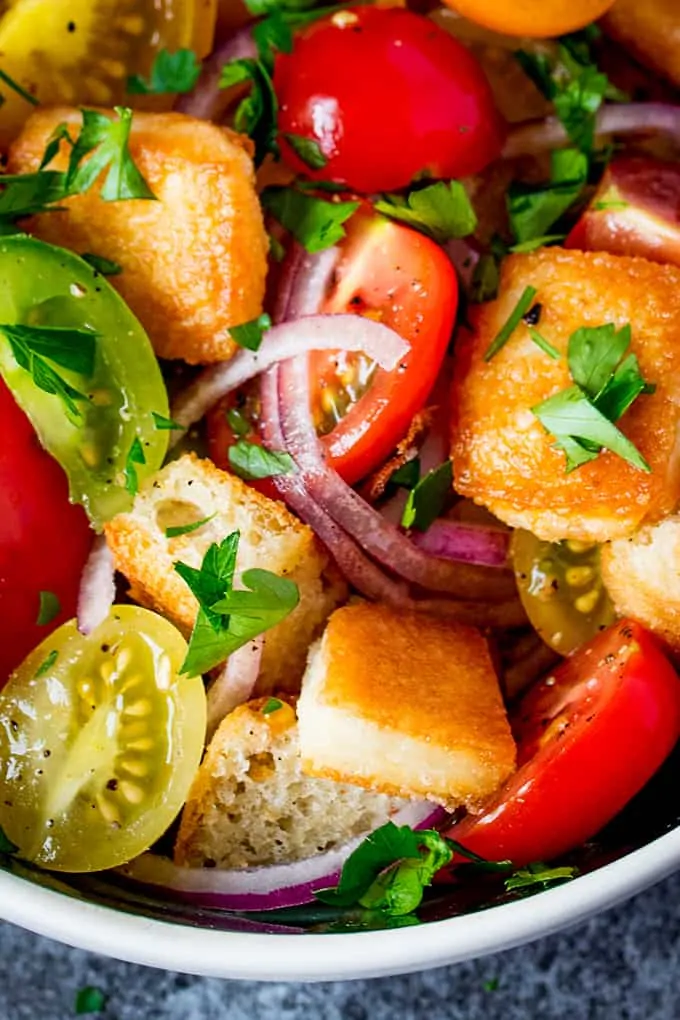 Panzanella Salad with Saganaki - Italy meets Greece in this juicy Tuscan tomato salad with crispy fried Greek cheese.