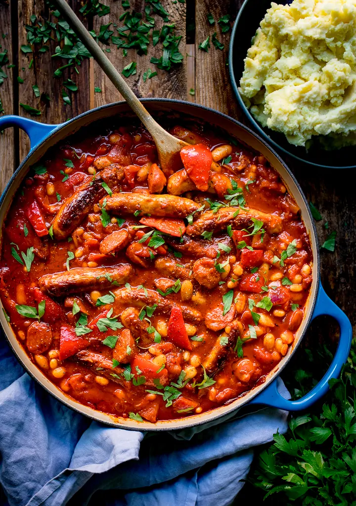 https://www.kitchensanctuary.com/wp-content/uploads/2016/10/Sausage-and-Bean-Casserole-tall-FS.webp