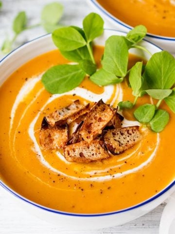 Baked sweet potato and carrot soup with cheddar potato skin croutons - A warming healthier soup. Gluten free & vegetarian.