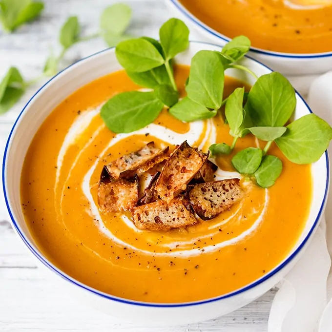 Baked sweet potato and carrot soup with cheddar potato skin croutons - A warming healthier soup. Gluten free & vegetarian.