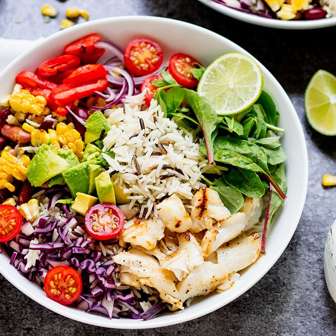 This Fish Taco Bowl with Zingy Yoghurt Dressing makes a fantastic energising dinner. Packed with healthy ingredients and gluten free too.