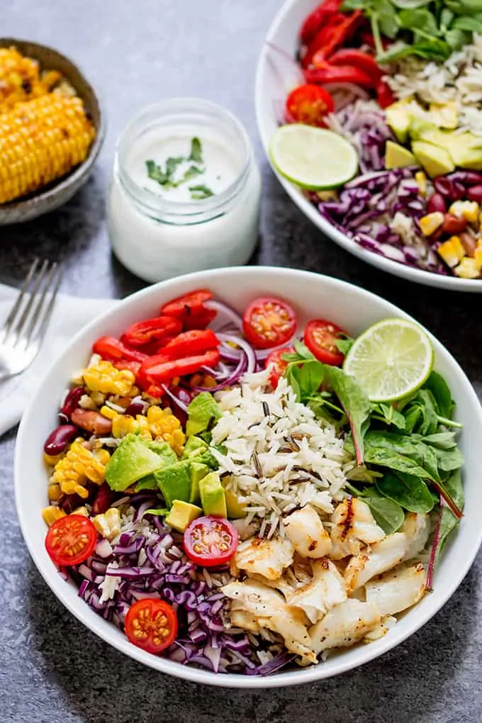 This Fish Taco Bowl with Zingy Yoghurt Dressing makes a fantastic energising dinner. Packed with healthy ingredients and gluten free too.