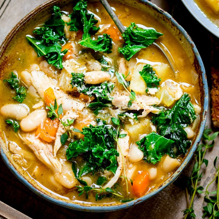 Tuscan Style Chicken Soup - a hearty soup with veggies and beans to warm up your belly!