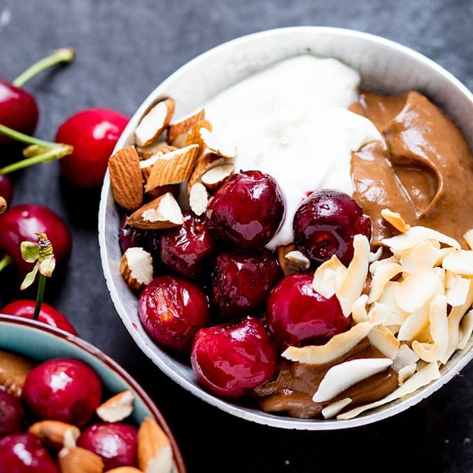 Avocado chocolate mousse bowl with roasted cherries - sweet, indulgent but healthier too!