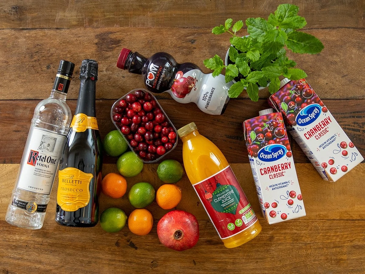 Ingredients for Christmas Punch on a wooden table