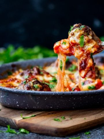 These One-Pot Cheesy Baked Meatballs are perfect when you're cooking for a crowd! Easily made gluten free or as a standby freezer meal.