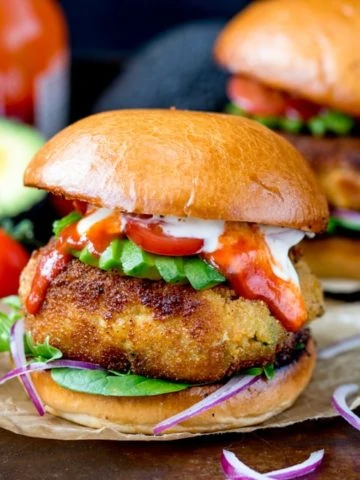 Cheesy Veggie Chickpea Burgers - easy to prepare and taste amazing!! Coated in breadcrumbs and lightly fried until crisp. Meat free and easy to make ahead!