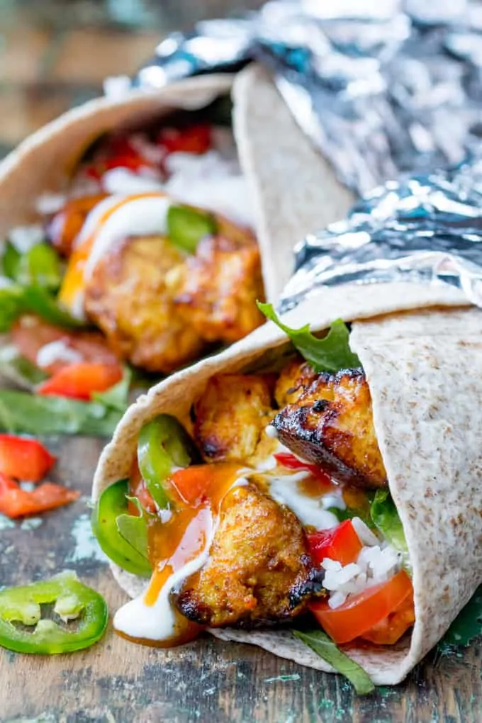 https://www.kitchensanctuary.com/wp-content/uploads/2017/02/Chicken-Tikka-Chapati-Burritos-tall-FS.webp