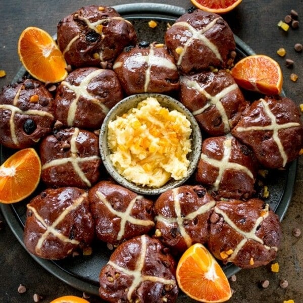 These Chocolate Orange Hots Cross Buns make a great Easter dessert or Breakfast! Serve warm, cold or lightly toasted with easy orange honey butter!