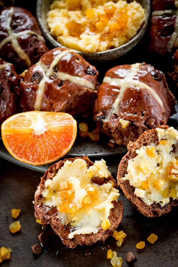 These Chocolate Orange Hots Cross Buns make a great Easter dessert or Breakfast! Serve warm, cold or lightly toasted with easy orange honey butter!