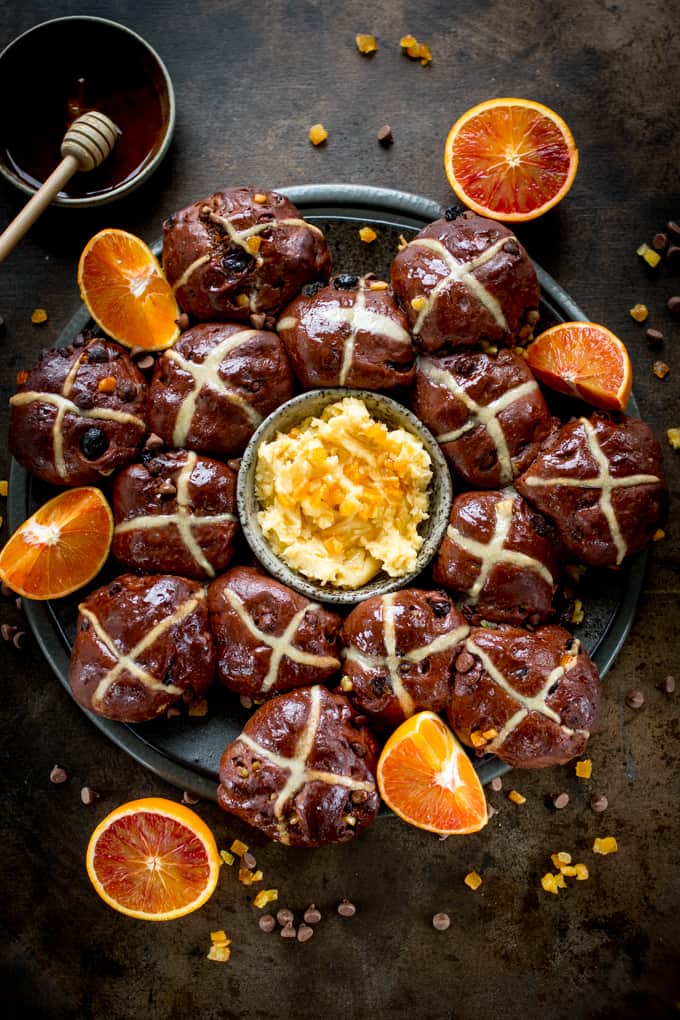 These Chocolate Orange Hots Cross Buns make a great Easter dessert or Breakfast! Serve warm, cold or lightly toasted with easy orange honey butter!