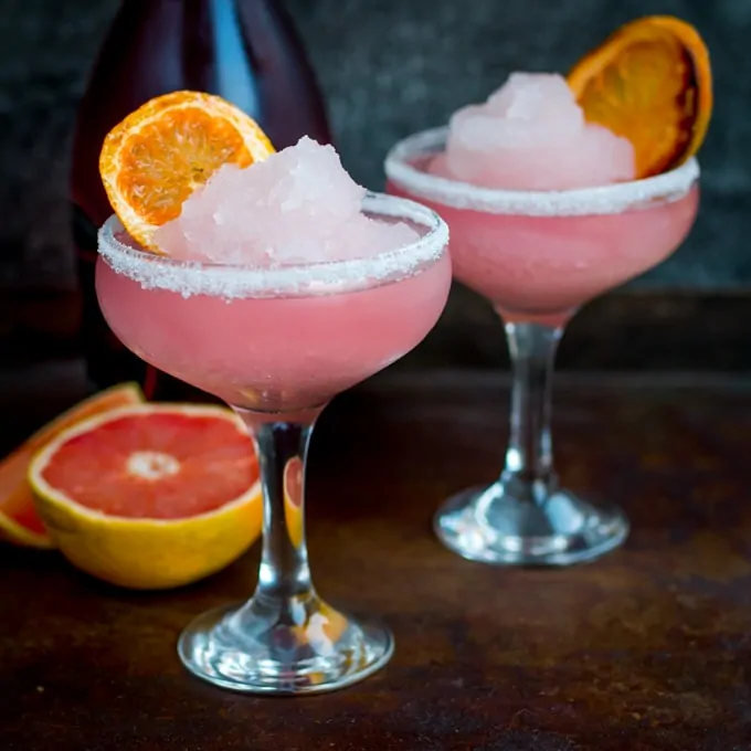 Frozen Pink Grapefruit Prosecco Cocktail - A pretty, cooling drink to kick off Spring! It's like a slush puppie for grown ups...