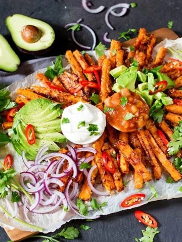 A lighter alternative to those crisps and dips - try my loaded Mexican-style carrot fries! A great party food, snack or lunch. Vegetarian and gluten free!