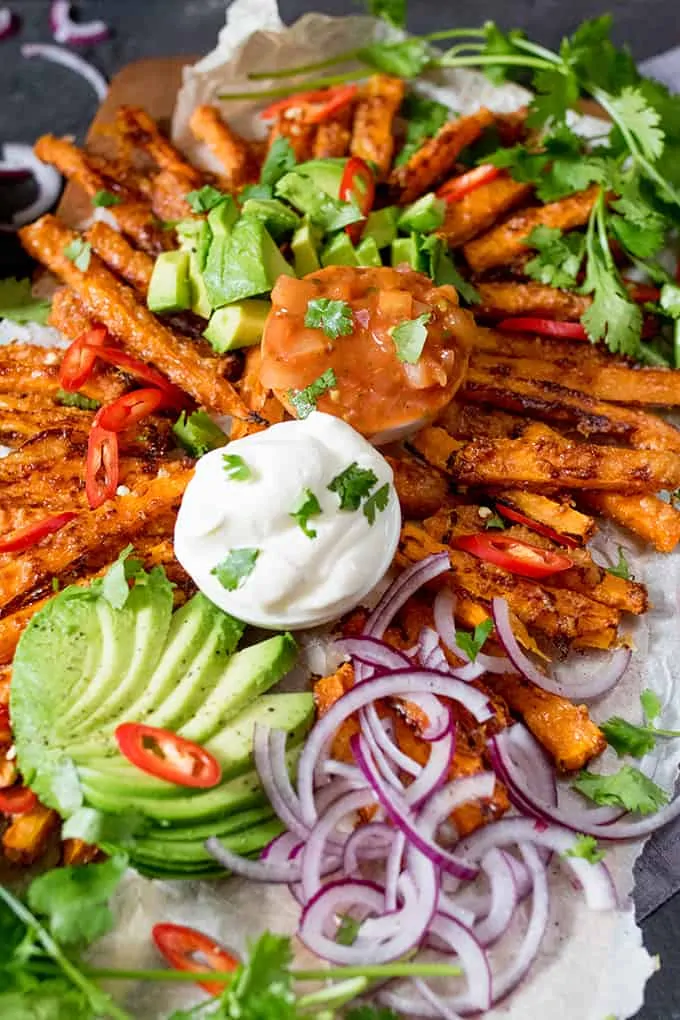 overhead photo of Mexican-style carrot fries with dips