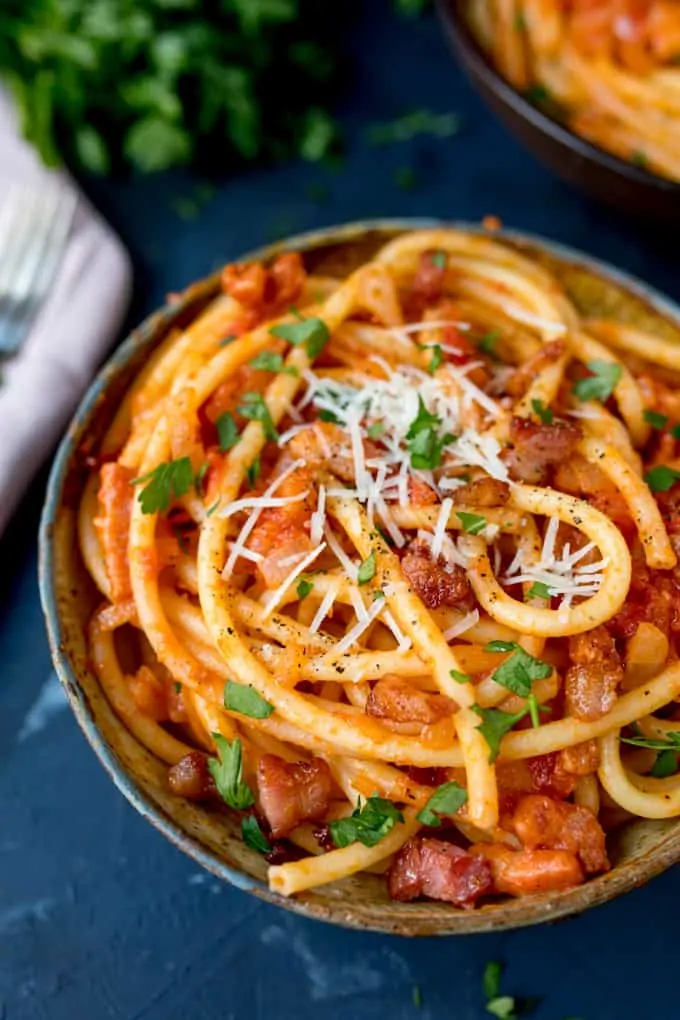 Close up portrait photo of Amatriciana pasta in a bowl