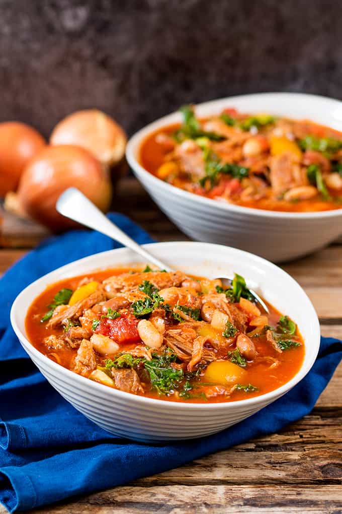 This slow-cooked pulled pork and bean soup makes a hearty and nutritious dinner. Gluten free too! It's freezable, so make a large batch!