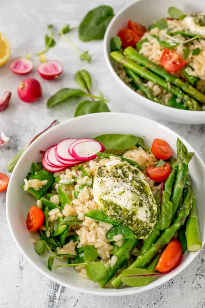 This Spring Vegetable Risotto with Creamy Pesto is creamy, cheesy and totally moreish! A fab gluten free and vegetarian dinner!