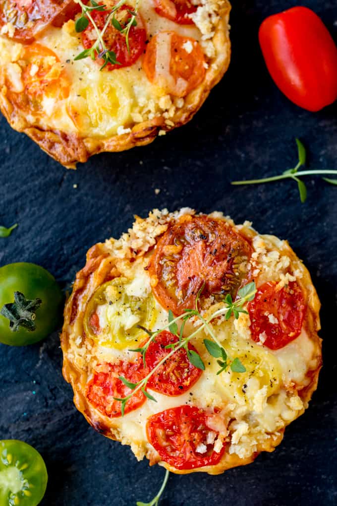Cheese and Tomato Tarts with a rich tomato ragu and creamy béchamel sauce encased in shortcrust pastry. The best vegetarian lunch!