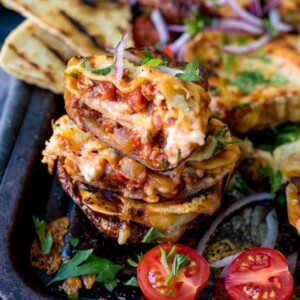 Lasagne Potato Skins - yep, this carb-fest is a winning dinner! This recipe makes a 8 potato skins PLUS a four-person lasagne to save for later.