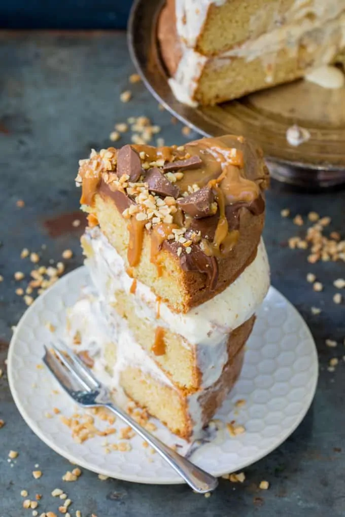 Chocolate Peanut Butter Ice Cream Cake with Salted Caramel - this three layer cake is an easy crowd-pleaser. A great Summer dessert!