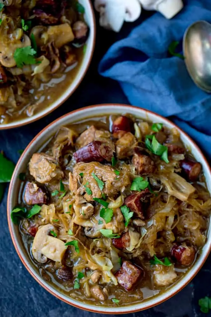 A Polish Classic - Hunter's Stew - or Bigos - from Ren Behan's new book Wild Honey and Rye! Made with polish sausage, pork and mushrooms!