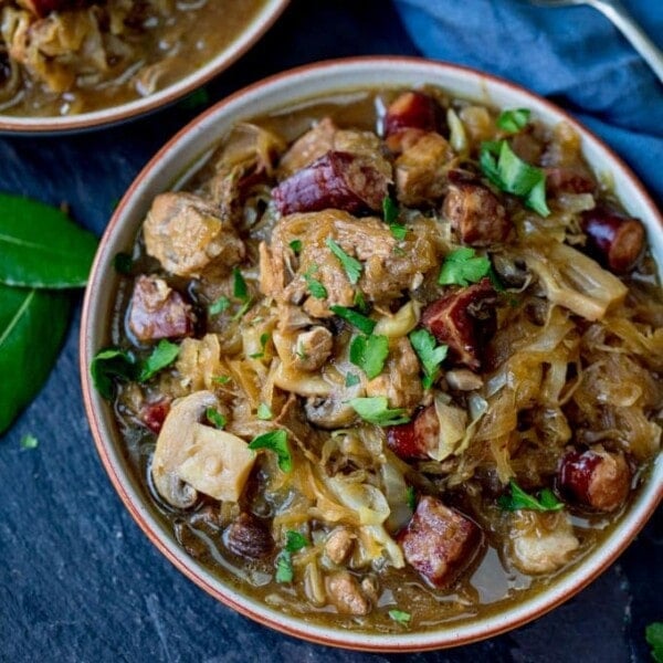 A Polish Classic - Hunter's Stew - or Bigos - from Ren Behan's new book Wild Honey and Rye! Made with polish sausage, pork and mushrooms!