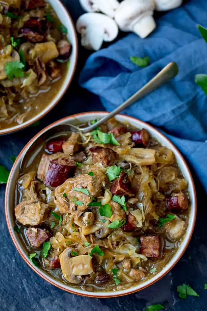 A Polish Classic - Hunter's Stew - or Bigos - from Ren Behan's new book Wild Honey and Rye! Made with polish sausage, pork and mushrooms!