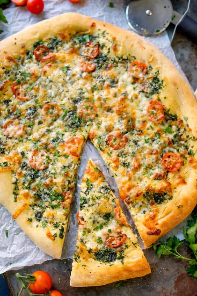 Homemade Cheese and Tomato Garlic Pizza Bread - a crisp dough with that perfect chewy interior, loaded with garlic, tomatoes and two types of cheese!