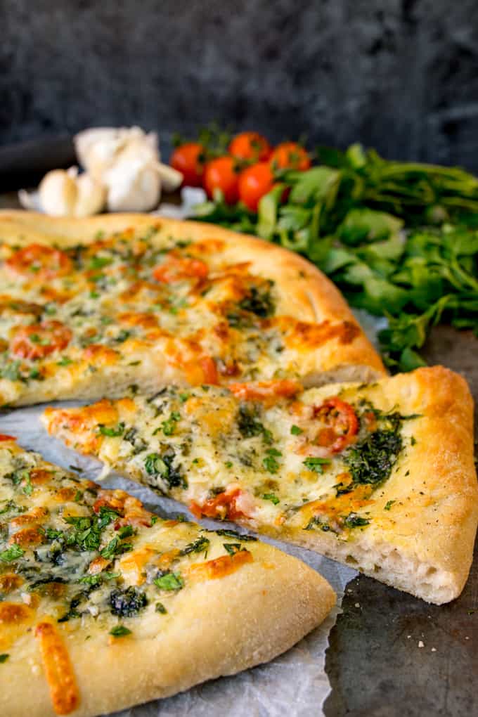 Homemade Cheese and Tomato Garlic Pizza Bread - a crisp dough with that perfect chewy interior, loaded with garlic, tomatoes and two types of cheese!