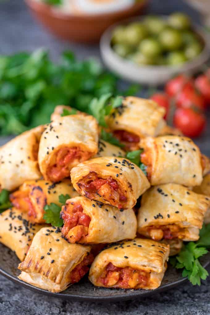 Chicken Chorizo Puff Pastry Rolls - This easy snack uses leftover pasta sauce. Have spaghetti for dinner, and these pastry rolls for lunch the next day!