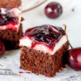 Hooray for two desserts in one with these Chocolate Cherry Cheesecake Brownies! Easily made gluten free! A brilliant party dessert!