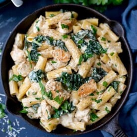 This One Pot Rigatoni Alfredo with Chicken and Kale in a creamy, rich garlic and parmesan sauce is serious comfort food!