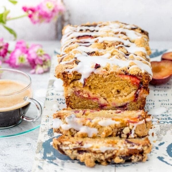 Plum Crumble Bread - with a crunchy, buttery streusel topping and almond icing drizzle! A delicious treat for brunch or afternoon tea!