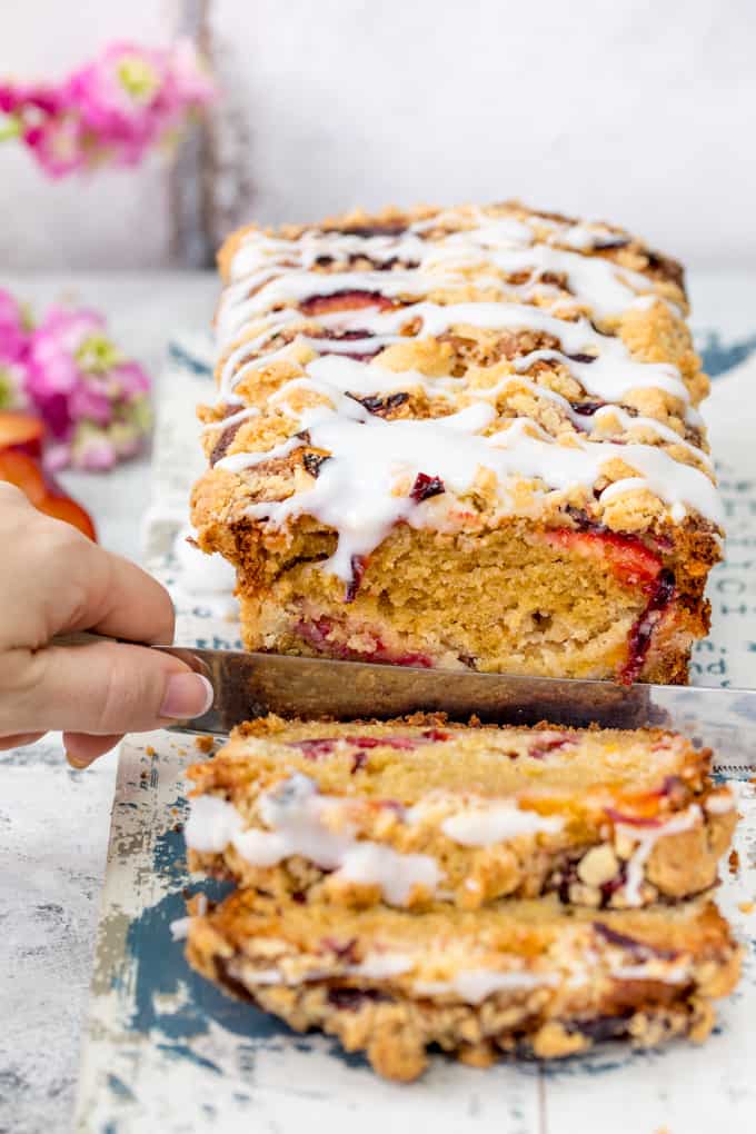 Plum Crumble Bread - with a crunchy, buttery streusel topping and almond icing drizzle! A delicious treat for brunch or afternoon tea!