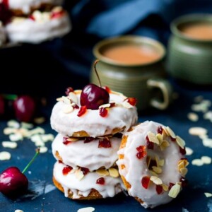 Cherry and Almond flavours come together perfectly in these baked cherry Bakewell doughnuts! #bakeddoughnut #bakeddonut #cherry #bakewell