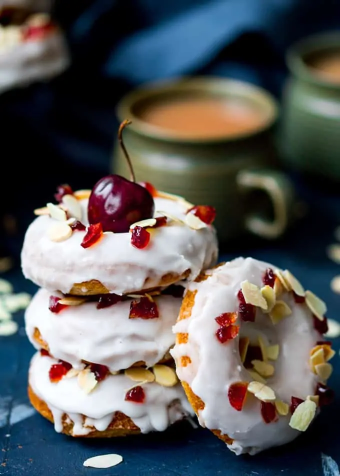 Cherry and Almond flavours come together perfectly in these baked cherry Bakewell doughnuts! #bakeddoughnut #bakeddonut #cherry #bakewell