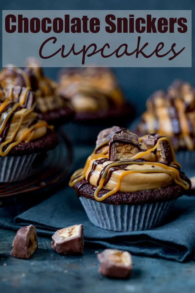 These Chocolate Snickers Cupcakes have a light and fluffy chocolate muffin base, topped with peanut butter frosting and little chunks of Snickers!