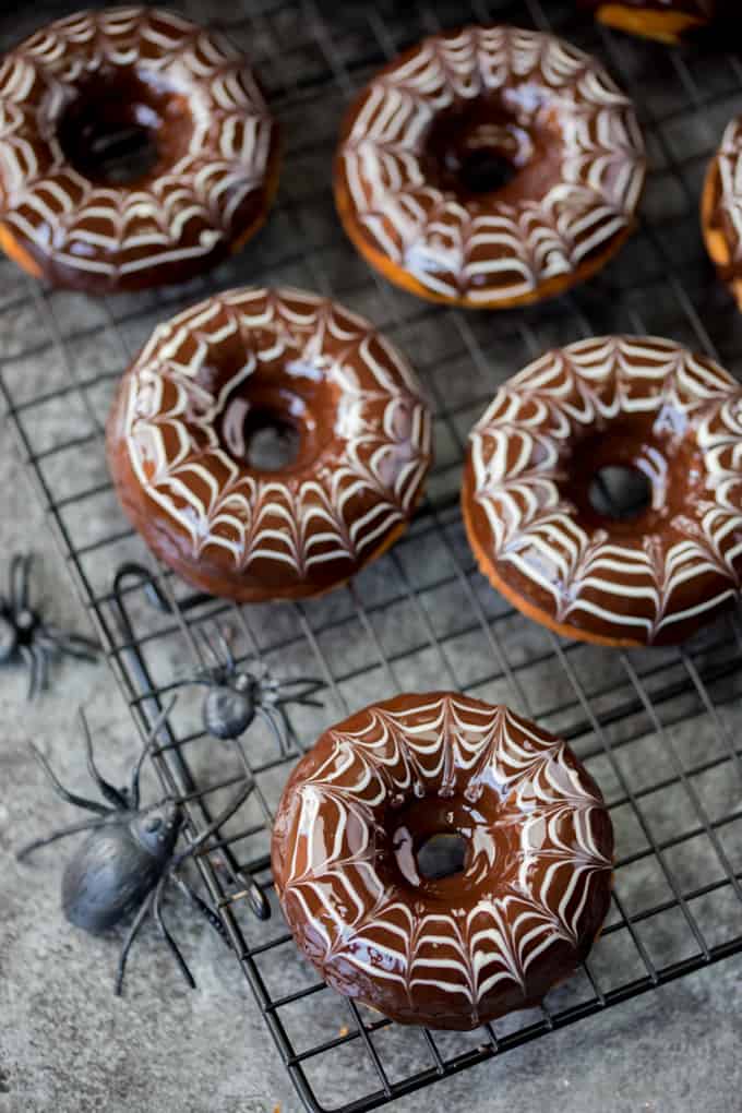 These baked Halloween Spider Web Doughnuts are easy to make and look fab on your party table!