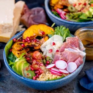 This Winter Nourish Bowl is satisfying comfort food that will make you feel fantastic! Filled with goodies like roasted pumpkin, bulgur wheat and avocado!