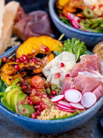 This Winter Nourish Bowl is satisfying comfort food that will make you feel fantastic! Filled with goodies like roasted pumpkin, bulgur wheat and avocado!
