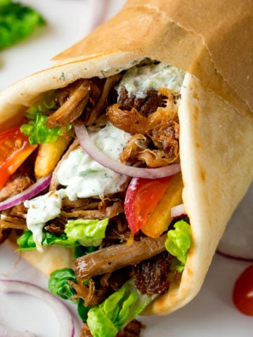 My favourite recipe for Crispy Pork Gyros with Homemade Tzatziki and how to get that perfect crispy-on-the-outside and tender-on-the-inside meat!