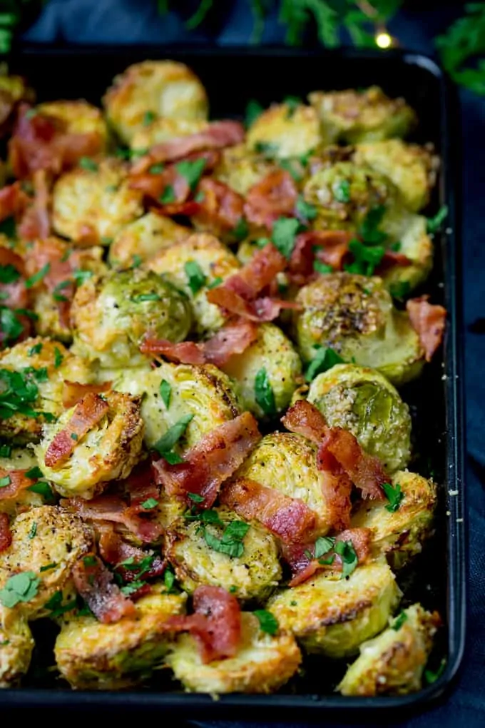 Tray of roasted sprouts with bacon bits