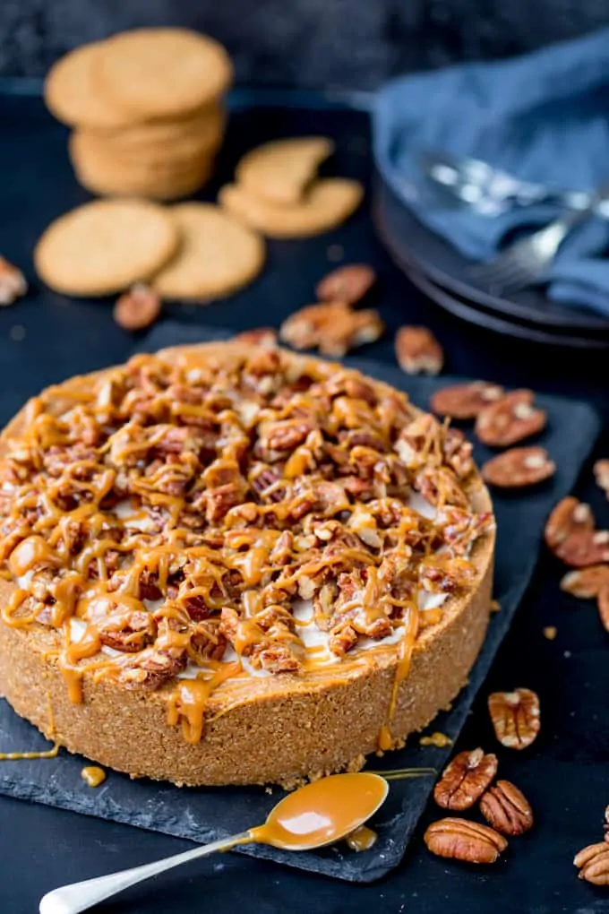 This Winter Spiced Pecan Caramel Cheesecake is an ideal dish for a celebration party table! It's also make ahead, no bake and gluten free!