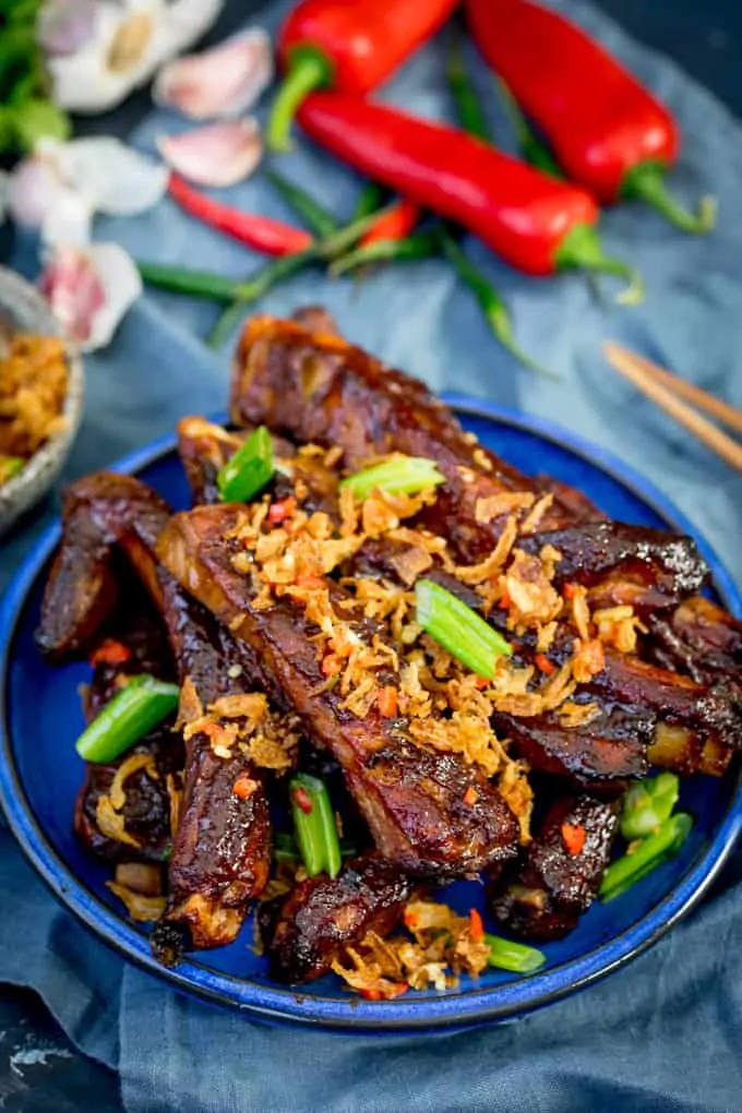 How about these Oven Baked Asian Ribs with Crispy Onions for Chinese New Year? Slow cooked in the oven until tender, then brushed with a sticky marinade and finished with crispy onions!