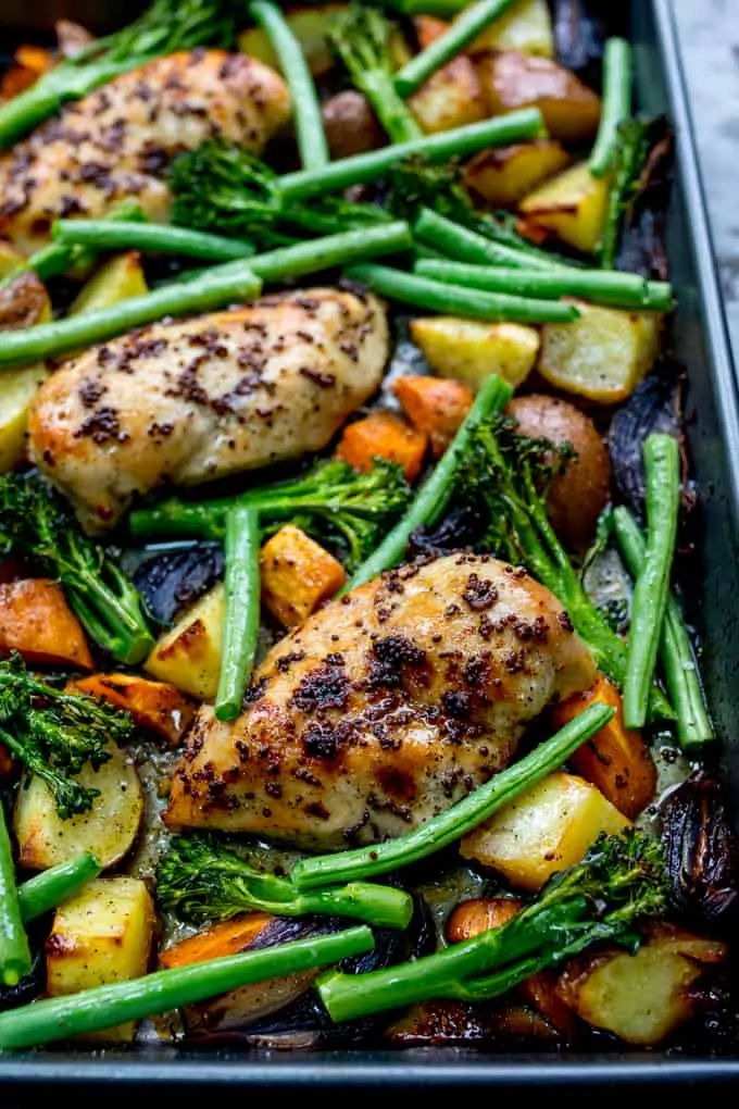 Sheet Pan Honey Mustard Chicken with Vegetables - A healthier option when you want a quick and easy dinner! Gluten free too! #sheetpanchicken #onepan #glutenfreedinner