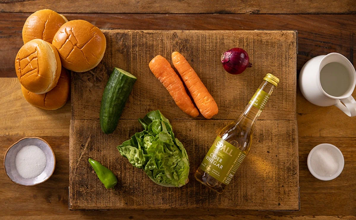 Ingredients for quick pickled veg for my sticky pork burger on a wooden board.