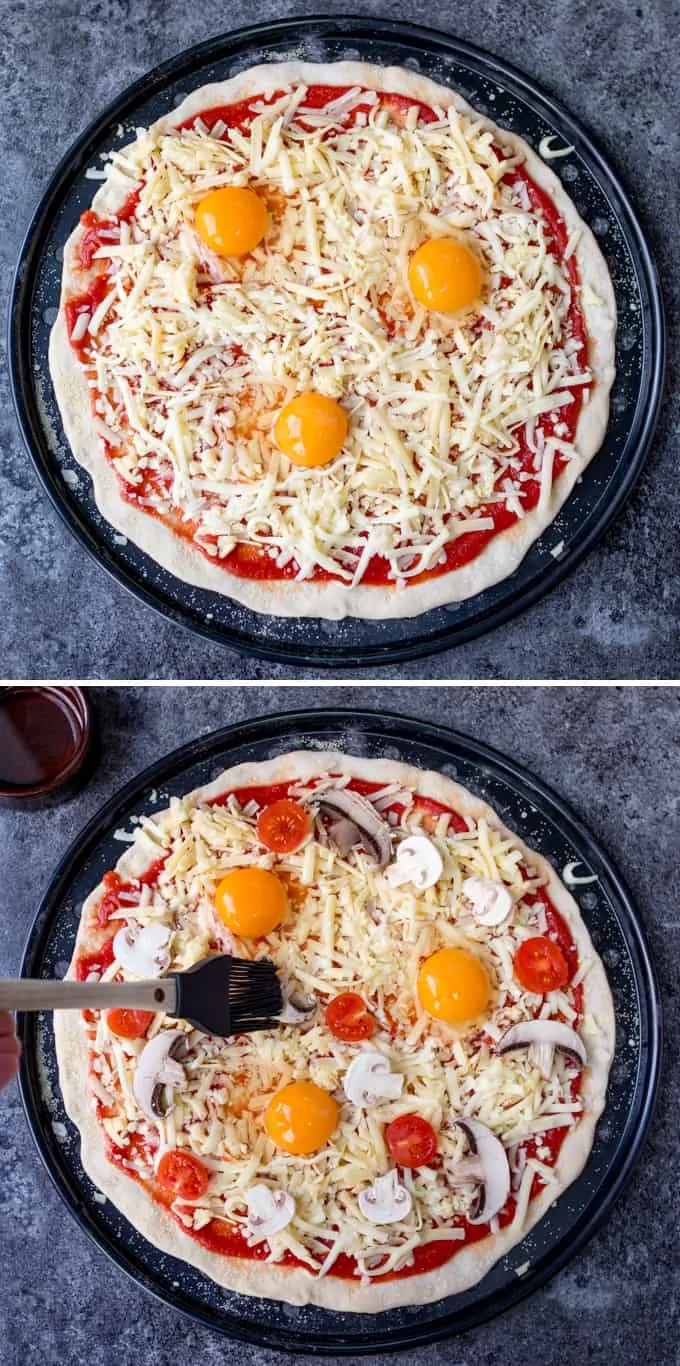 Two photos showing prep of a breakfast pizza. The top image with pizza sauce, cheese and raw eggs on top, the bottom image with added tomatoes and mushrooms. The mushrooms are being brushed with melted butter.