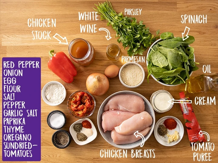 Ingredients for Tuscan chicken on a wooden table